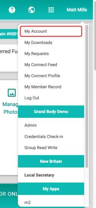 The open name menu in M2 with My Account, the first item, outlined in red above My Downloads, My Requests, My Connect Feed, My Connect Profile, My Member Record, and Log Out.